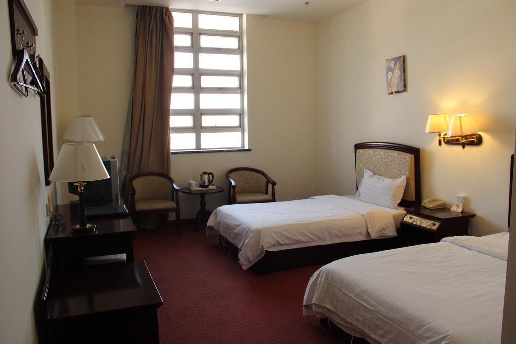Super 8 Beijing Yizhuang Tianbao Hotel Quarto foto